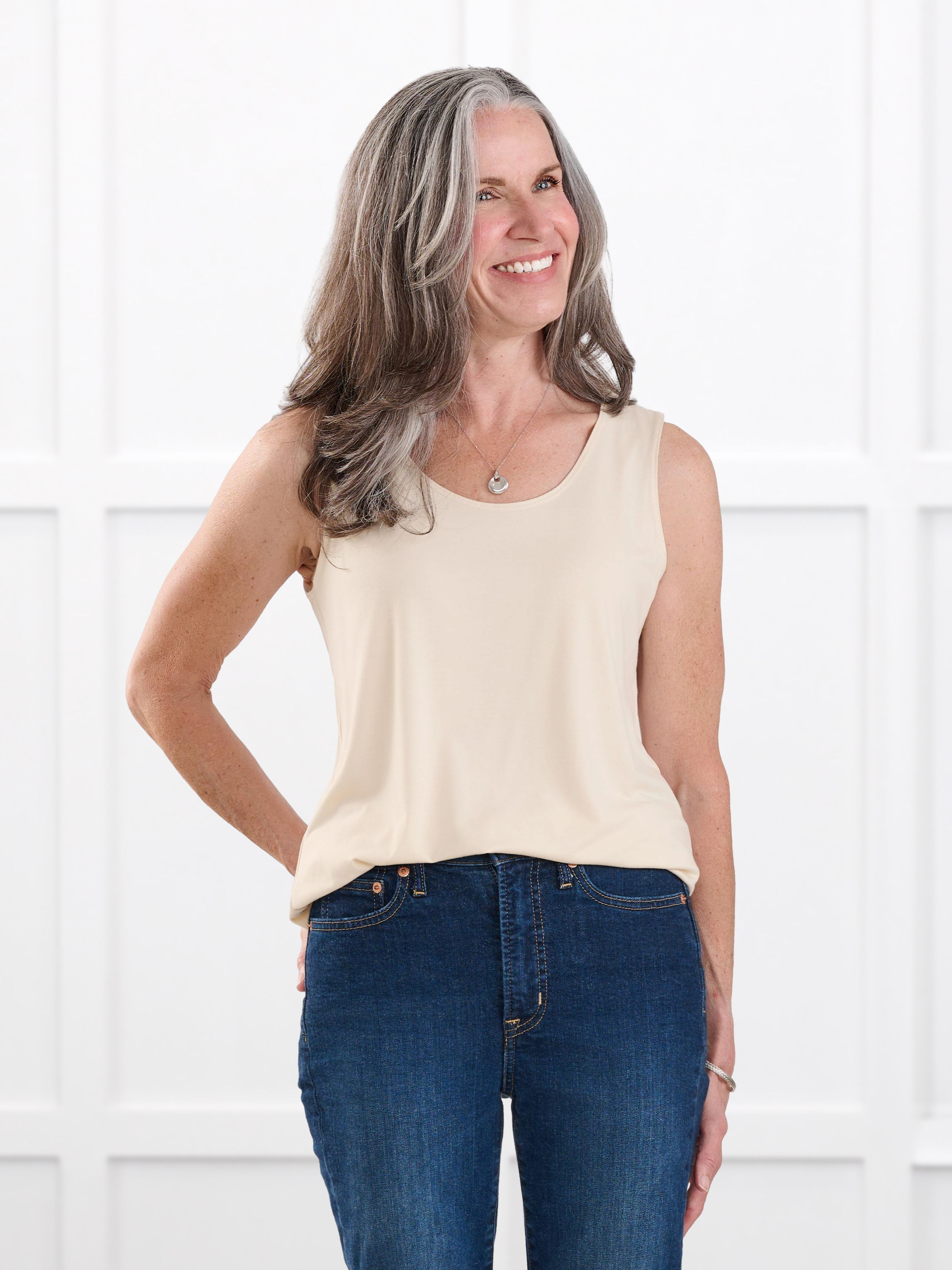 Woman wearing Miik's Shandra reversible tank in shortbread