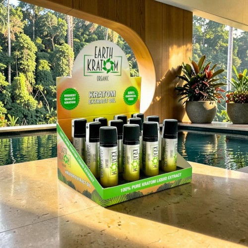 Display of spray bottles in a bright, tropical indoor setting.