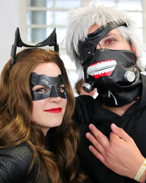Image of man and woman dressed up in cosplay costumes. 