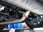 Multiple train horns mounted chassis bracket exhaust muffler Raymond's RAV4 844K Nightmare Edition undercarriage gallery photo 6