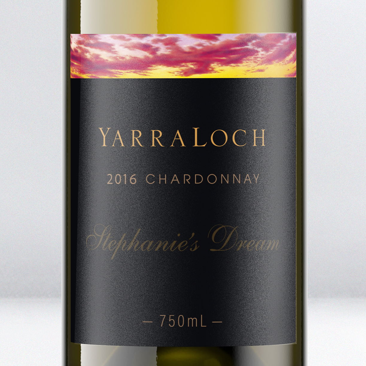 A bottle of wine with promotional text and award badges.