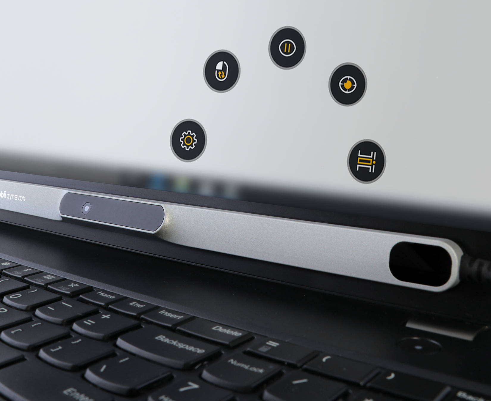 Tobii Dynavox PCEye eye tracker on a laptop featuring TD Control