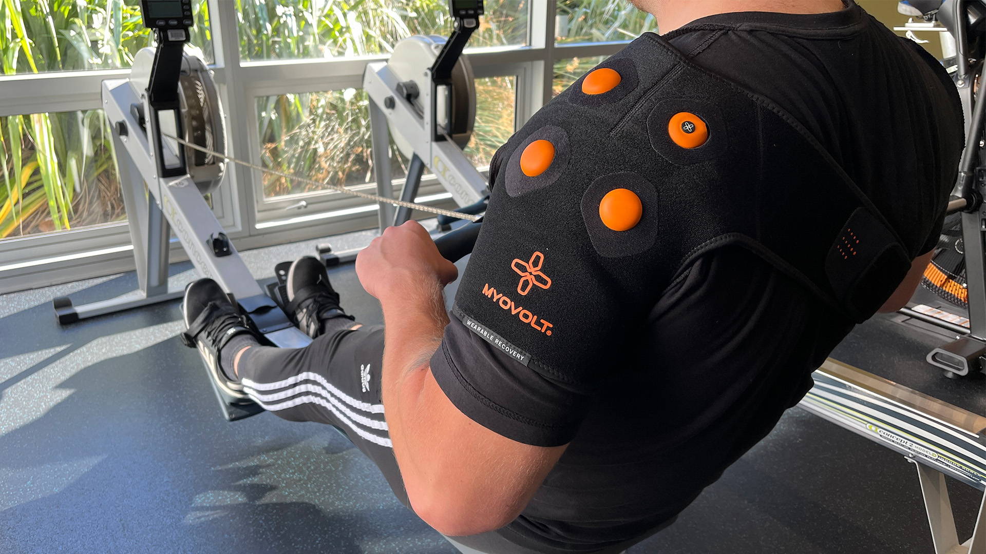 Ease muscle tension, pain and stiffness in the shoulder joint with Myovolt vibration therapy shoulder brace suitable for shoulder pain caused by rowing.