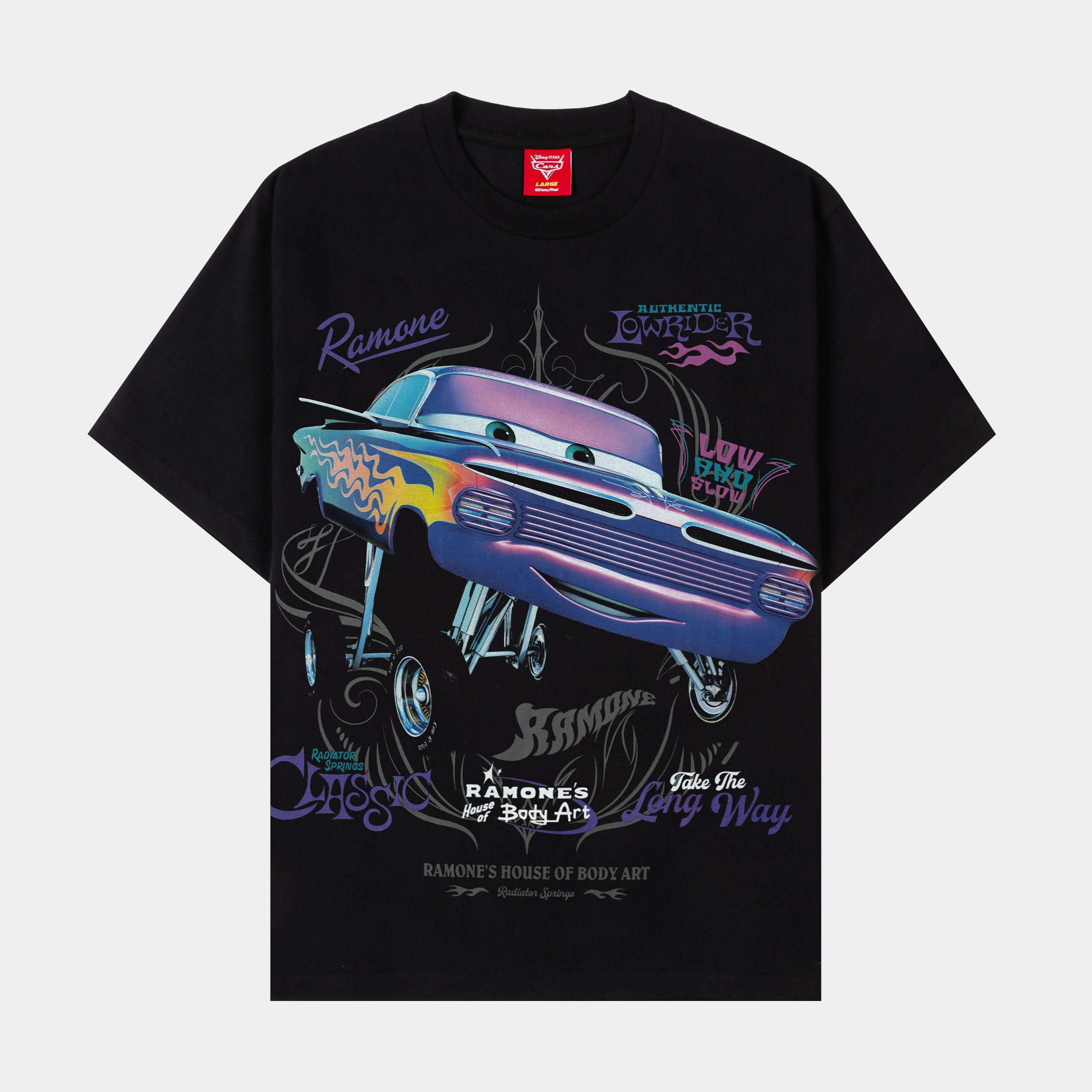 Black t-shirt featuring a colorful car graphic and playful text.