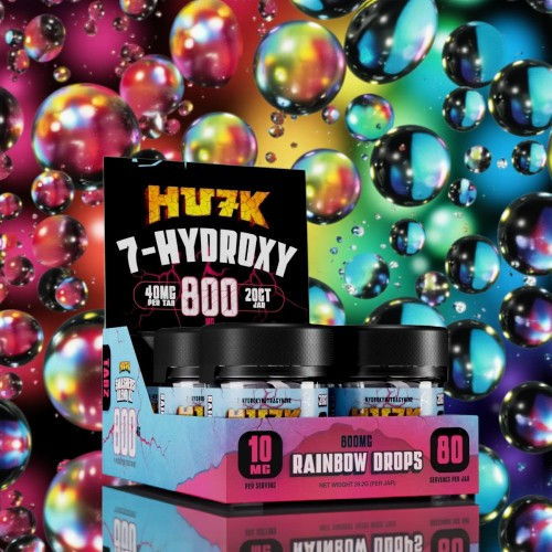 Display of product boxes against a colorful bubble background.