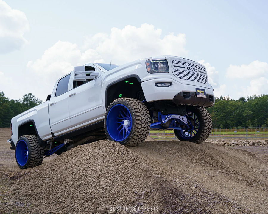 Side profile of 2017 GMC Sierra 1500 with Shocker S6 544K Nightmare Edition train horn install HornBlasters gallery photo 2