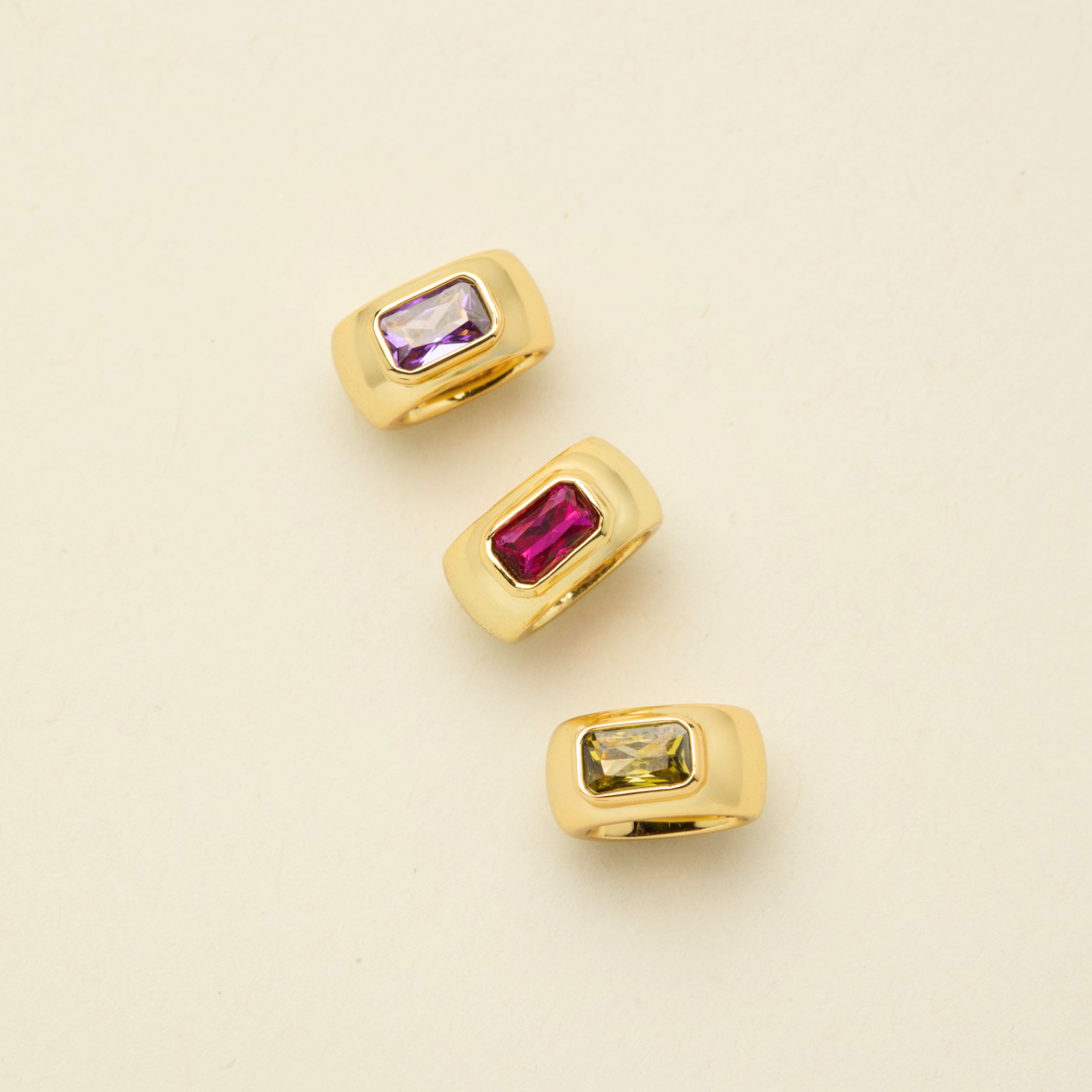 Layered gold charm necklaces with birthstones and dangles for personalized keepsake jewelry