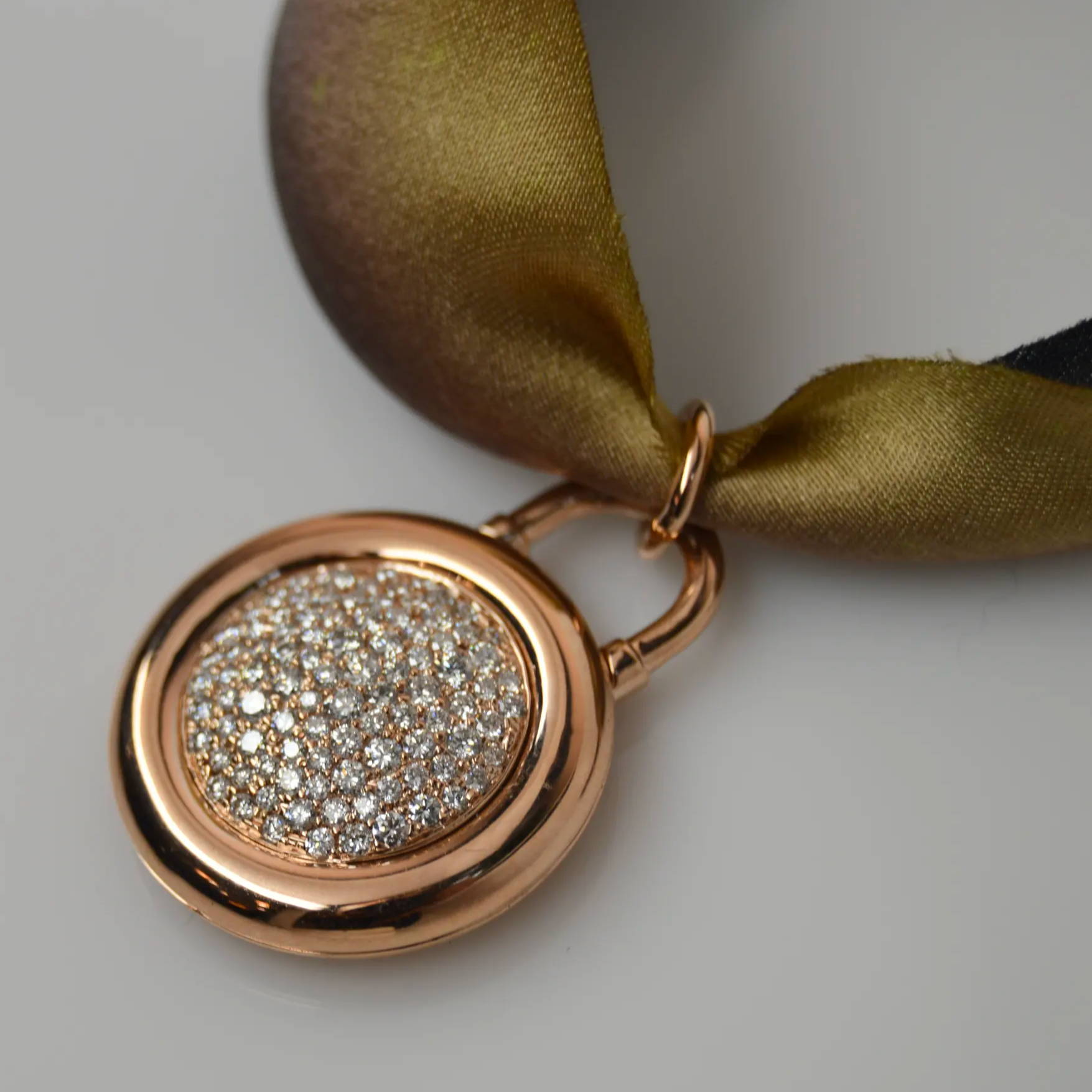 pave diamond locket side view