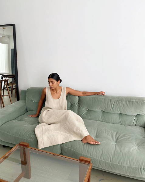 Monikh wearing beige natural scoop back linen maxi dress