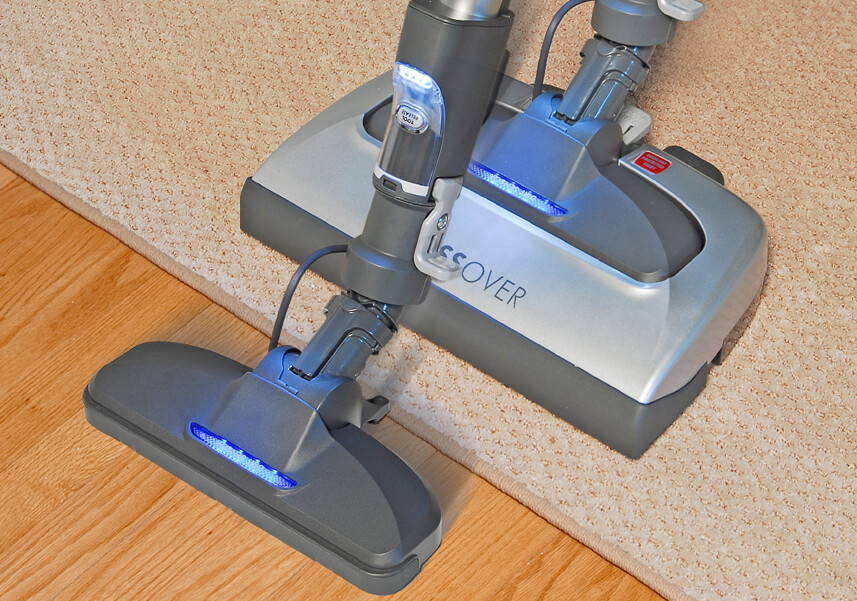 Two Kenmore® vacuums featured on the hardwood floor and carpet