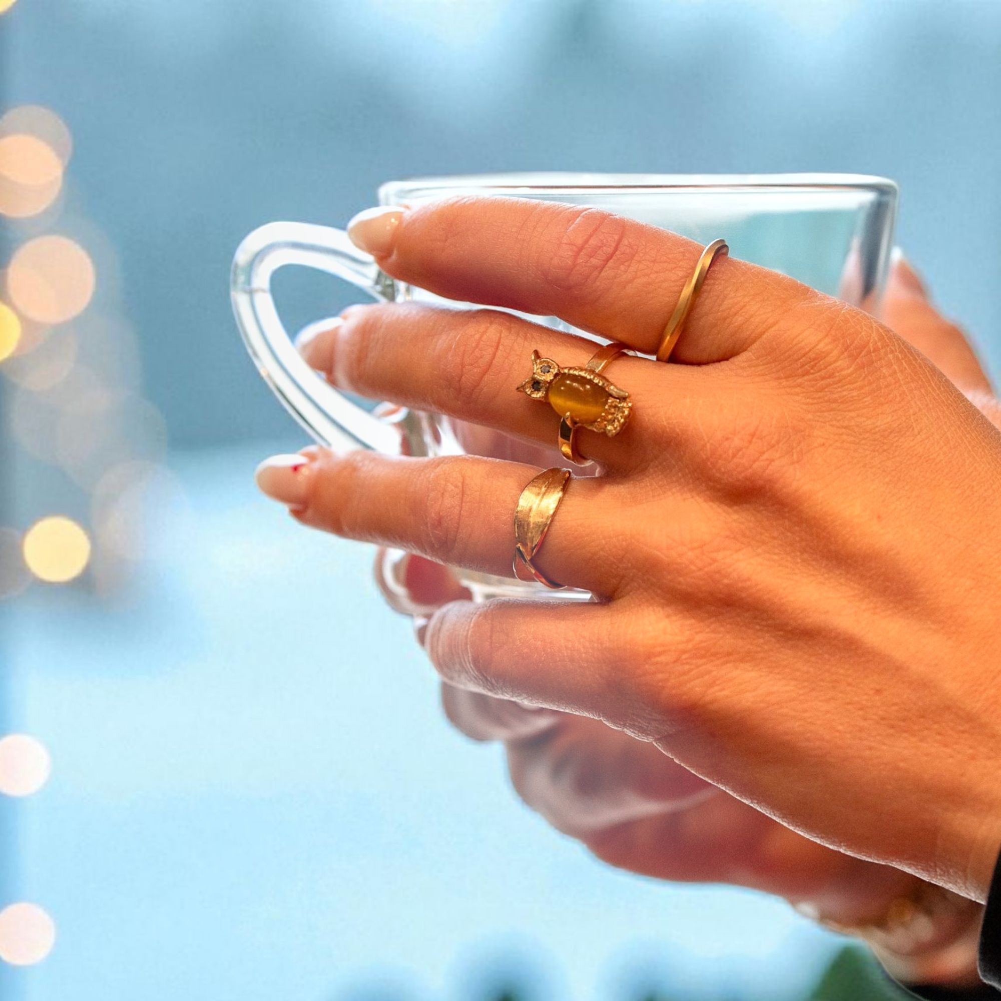 Jenny Lin upcycled rings at Henne Jewelers on a hand