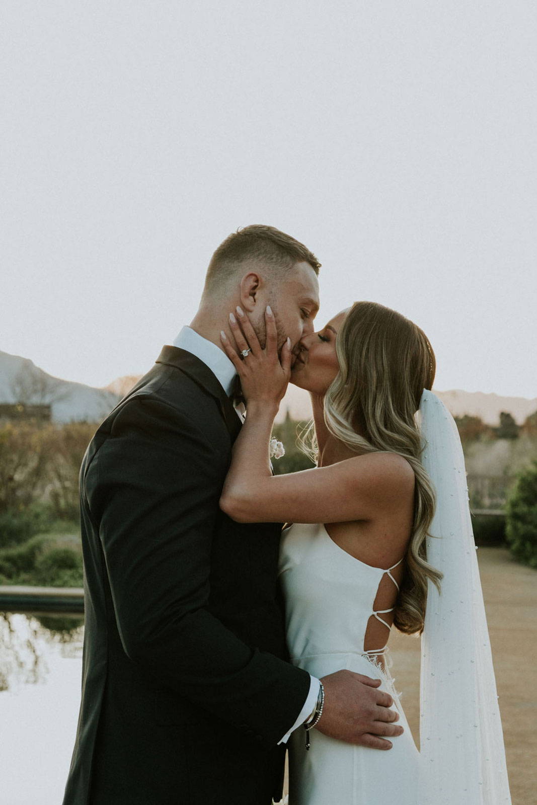 GRACE Bride, Kirsty kissing her new husband, Ruan