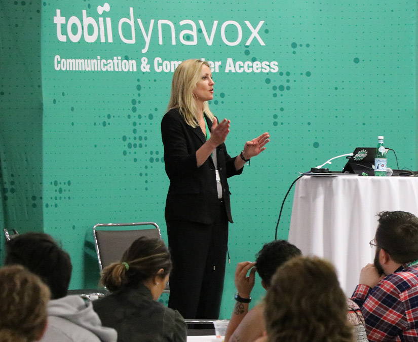  Woman delivering a Tobii Dynavox training session to an audience 