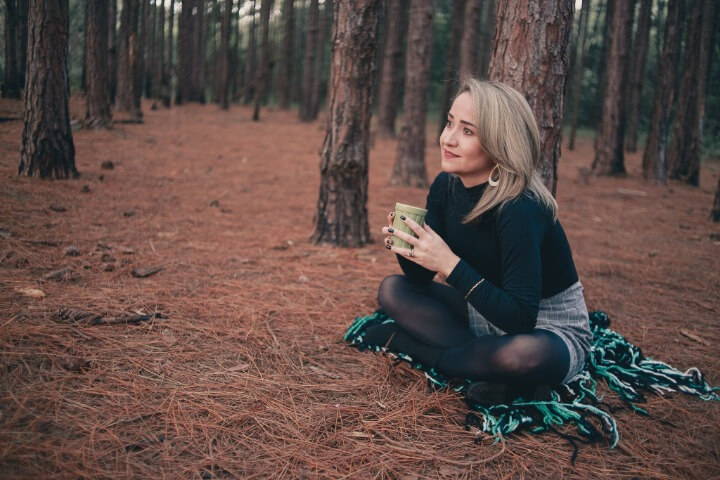 Woman Sitting in the Forest