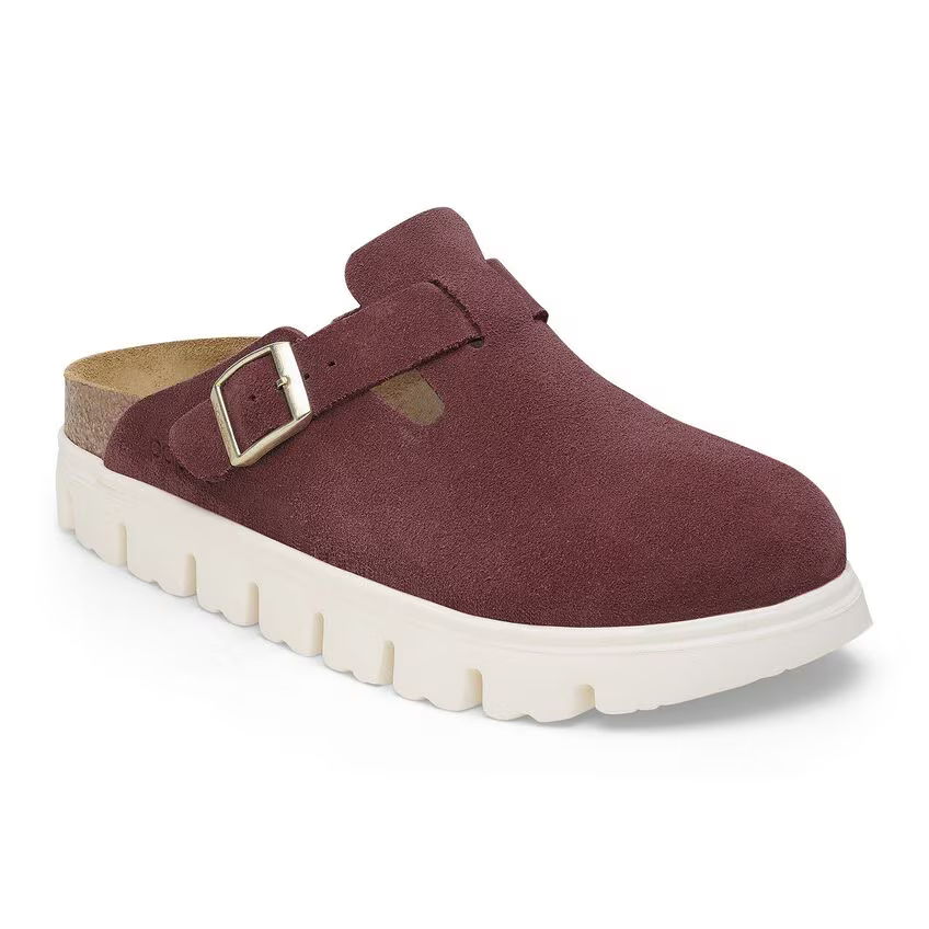 Maroon clogs with a white sole and a strap.