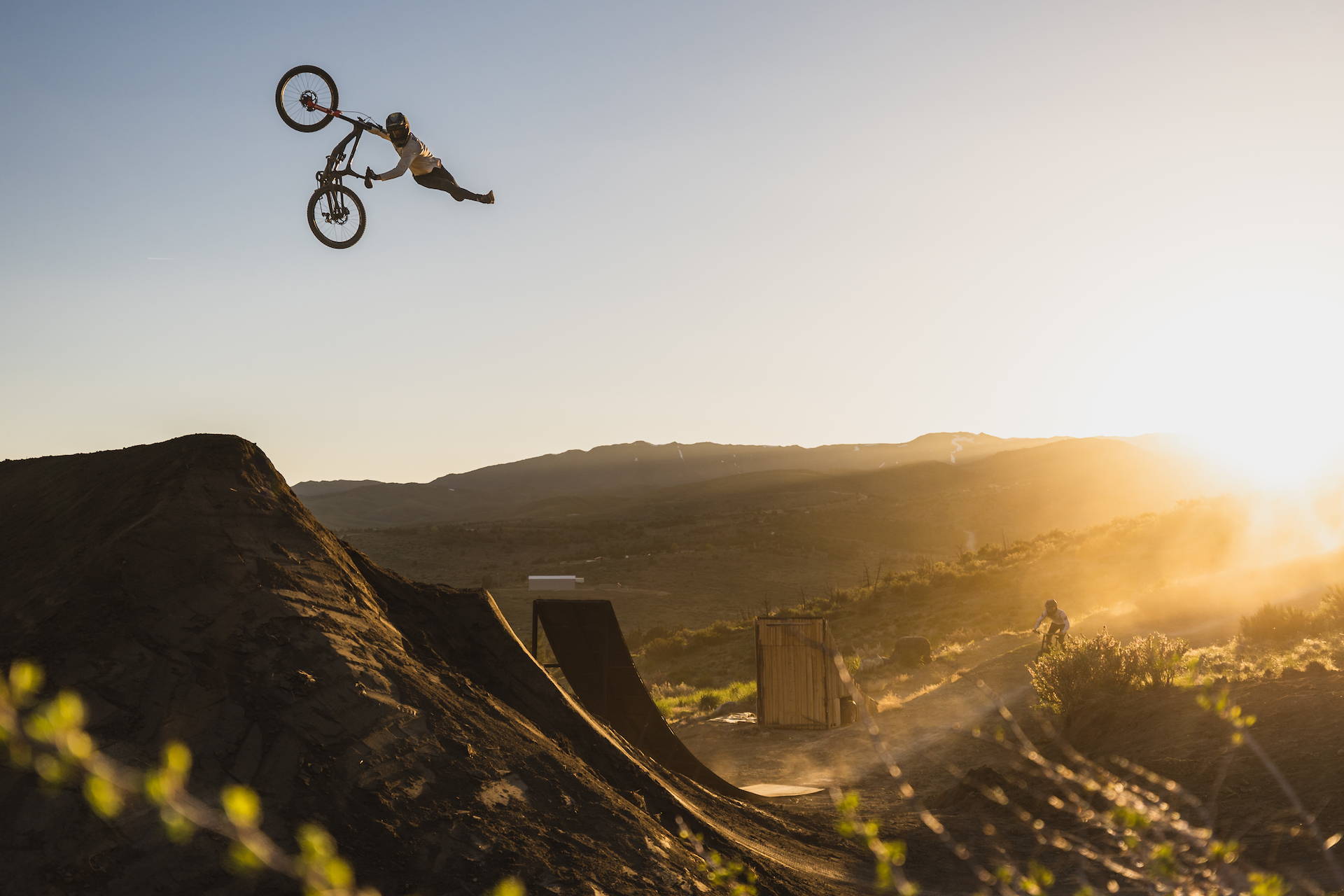 DJ Brandt hitting big features on his Nukeproof Dissent downhill bike