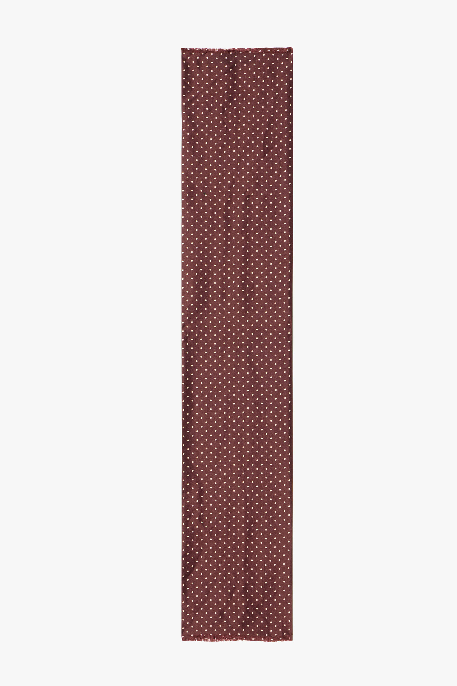 Maroon patterned fabric swatch on a white background.