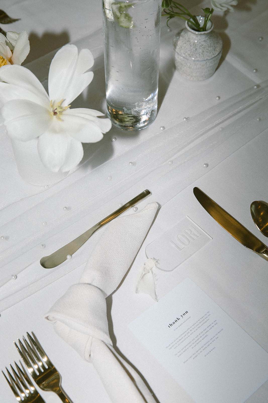 Wedding Table set details, with pearls and gold cutleries 