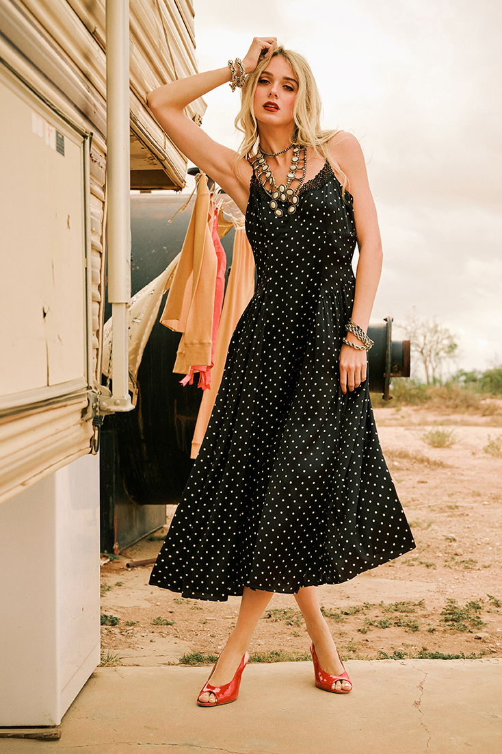Haley wearing the Spew Slip Dress with Double D Ranch jewelry and accessories.