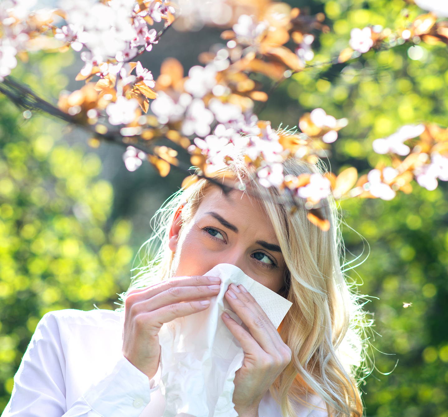 Young woman with seasonal hay fever