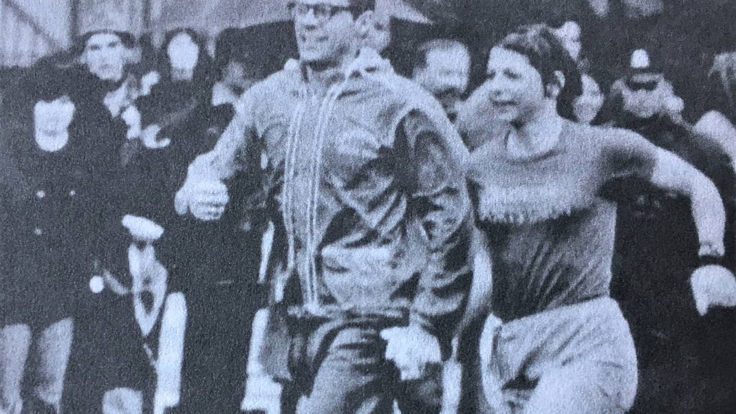 Sara with husband Larry running into the finish of the Boston Marathon 1970
