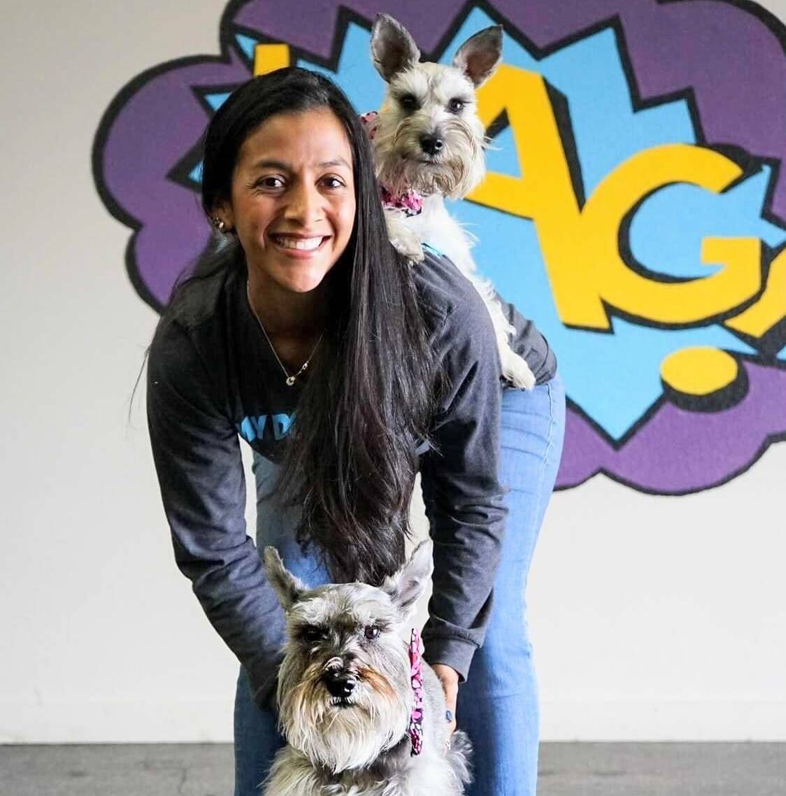 Stephanie Garza, certified dog trainer, behaviorist, and nutritionist with her dog.