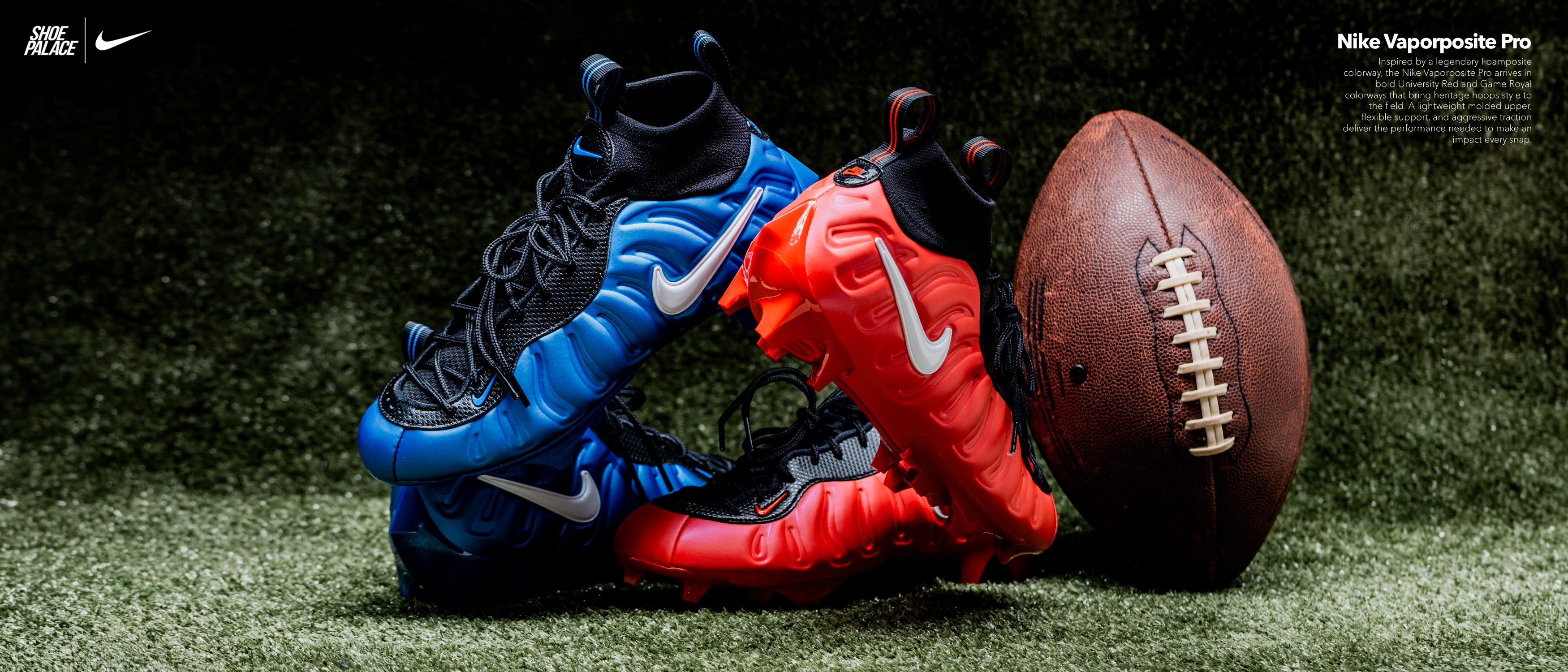 Blue and red football cleats next to a football on grass.