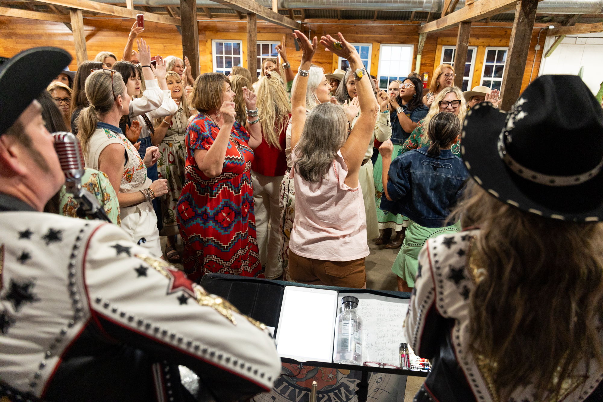 A group of dancing queens enjoying the evening with 2Country4Nashville.