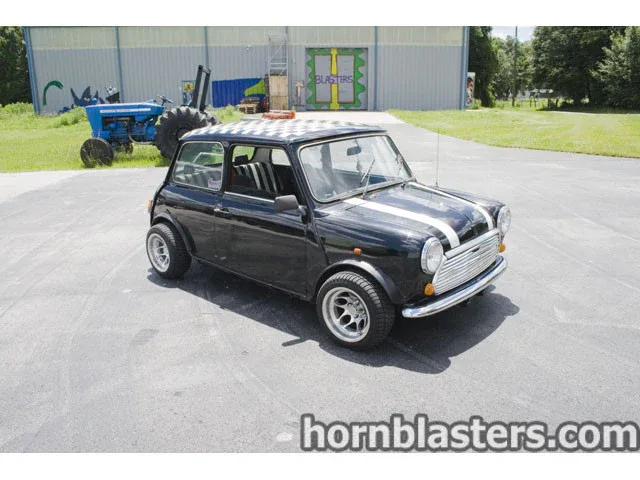 Rear three-quarter Chad's MINI Cooper tail lamps hatch and stance with train horn build context gallery photo 3