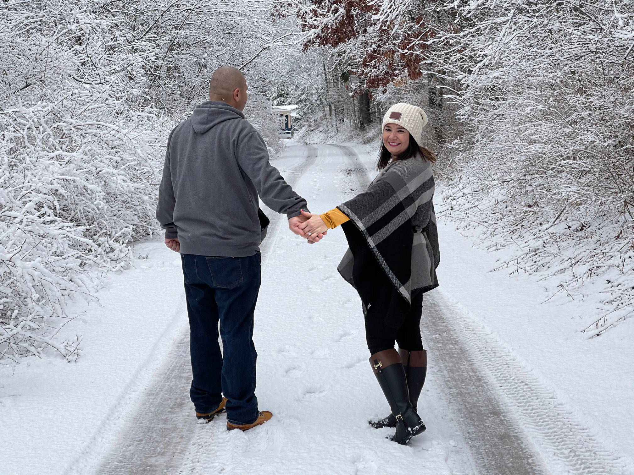 Brady Proposing to Coleen On One Knee with an Engagement Ring from Henne Jewelers