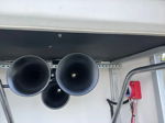 Interior helm and lounge seating view on Jason's Triton pontoon boat photo 5