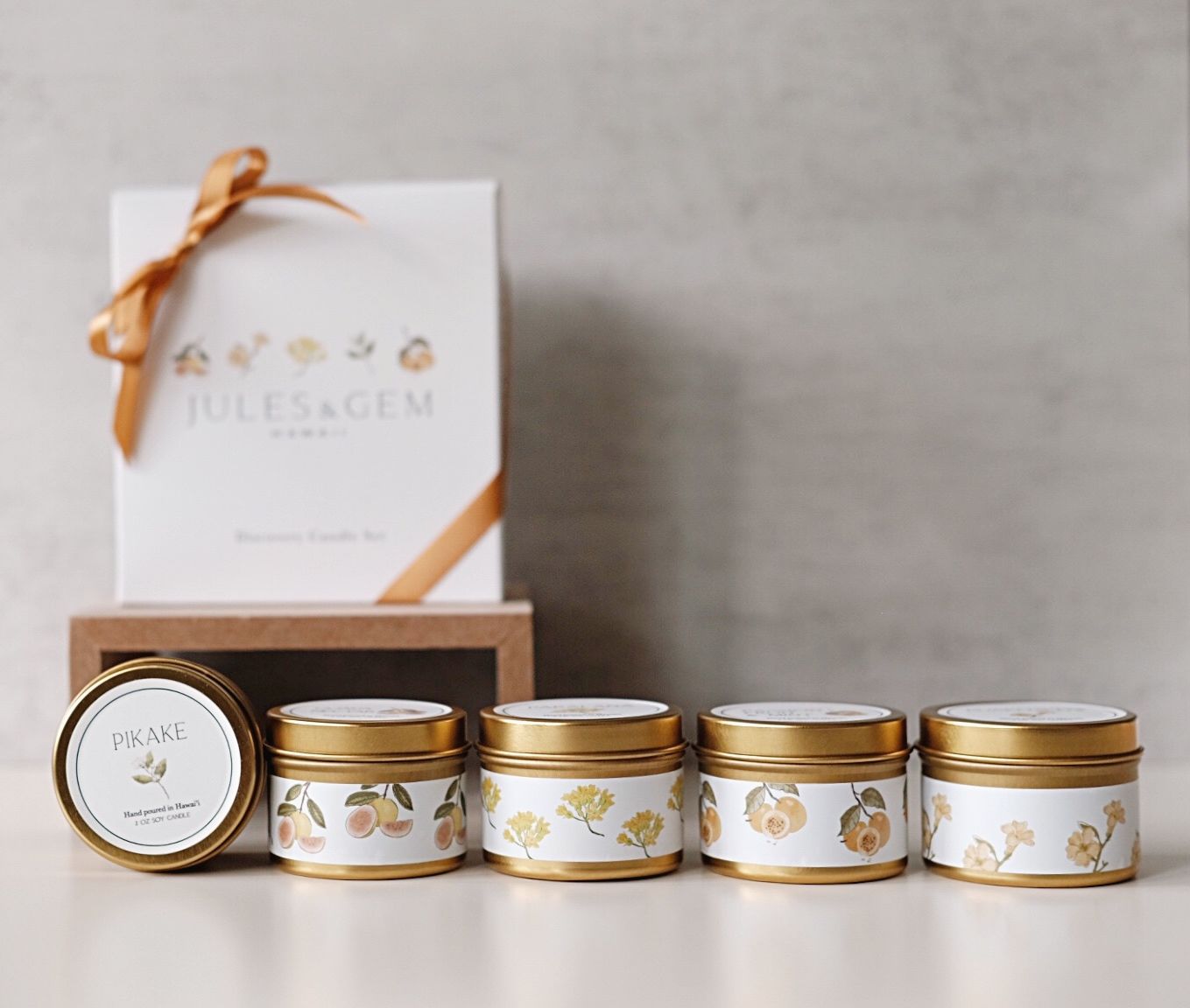 five gold 2oz candle tins with gift box