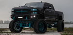 Brandon's black lifted 2018 Chevrolet Silverado 2500 with teal suspension thumbnail