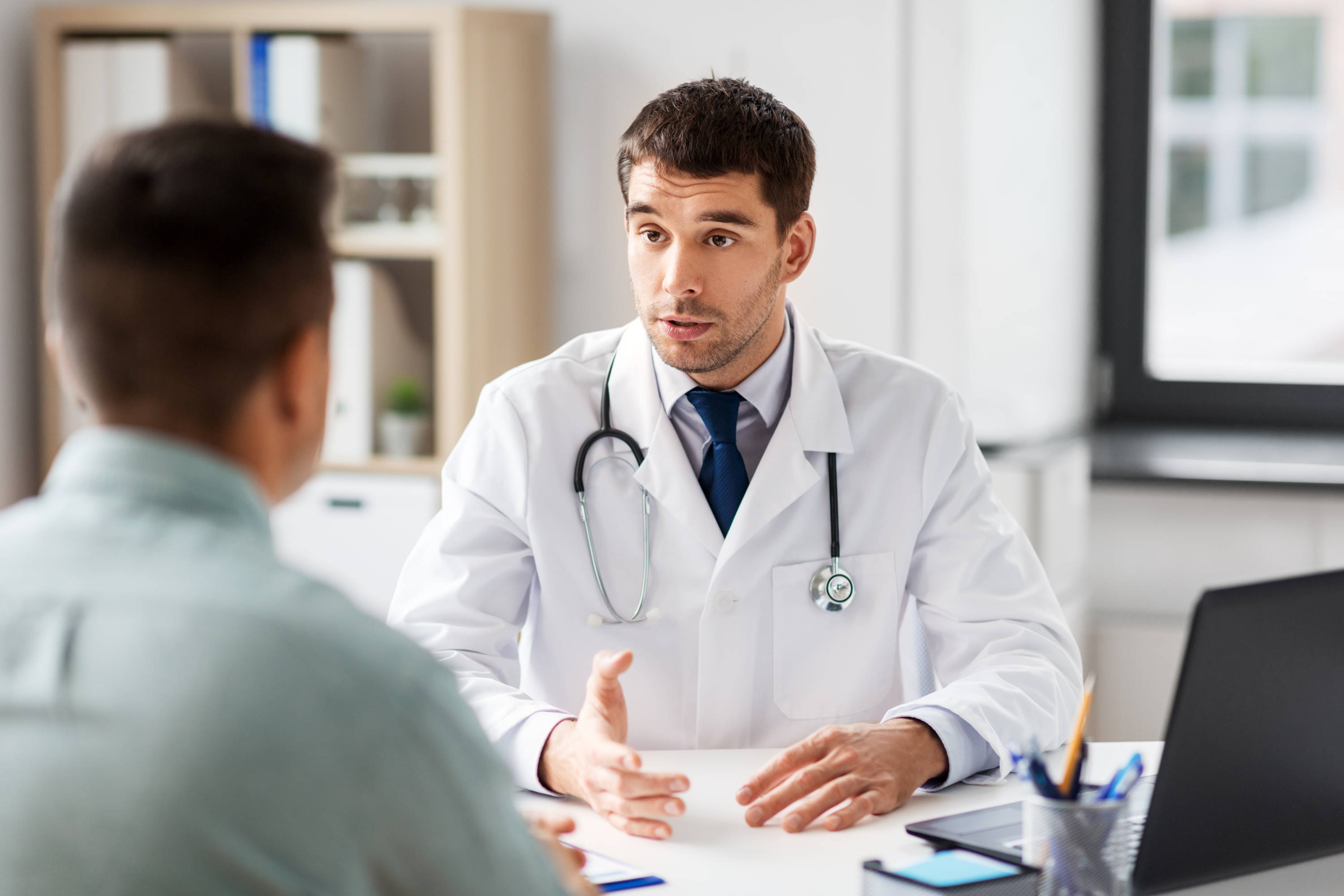 Doctor explaining diagnosis to patient