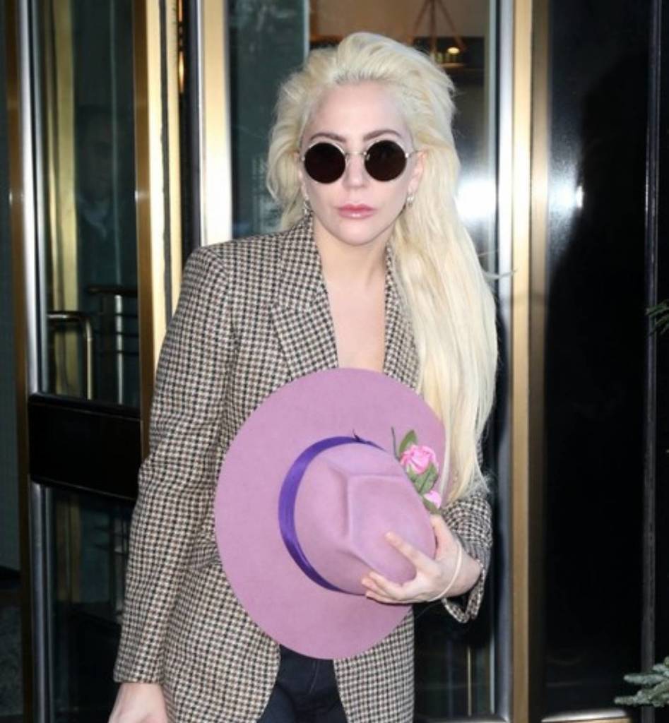 Lady Gaga wearing round sunglasses