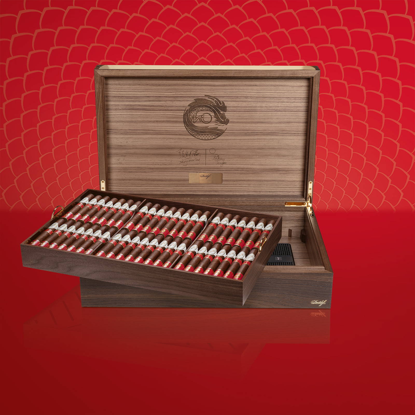 The opened Davidoff Year of the Dragon Masterpiece Humidor with a tray filled with cigars.