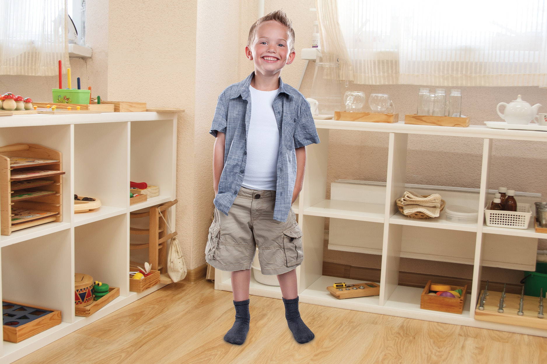 Boy at school wearing SmartKnitKIDS Seamless Compresso-T