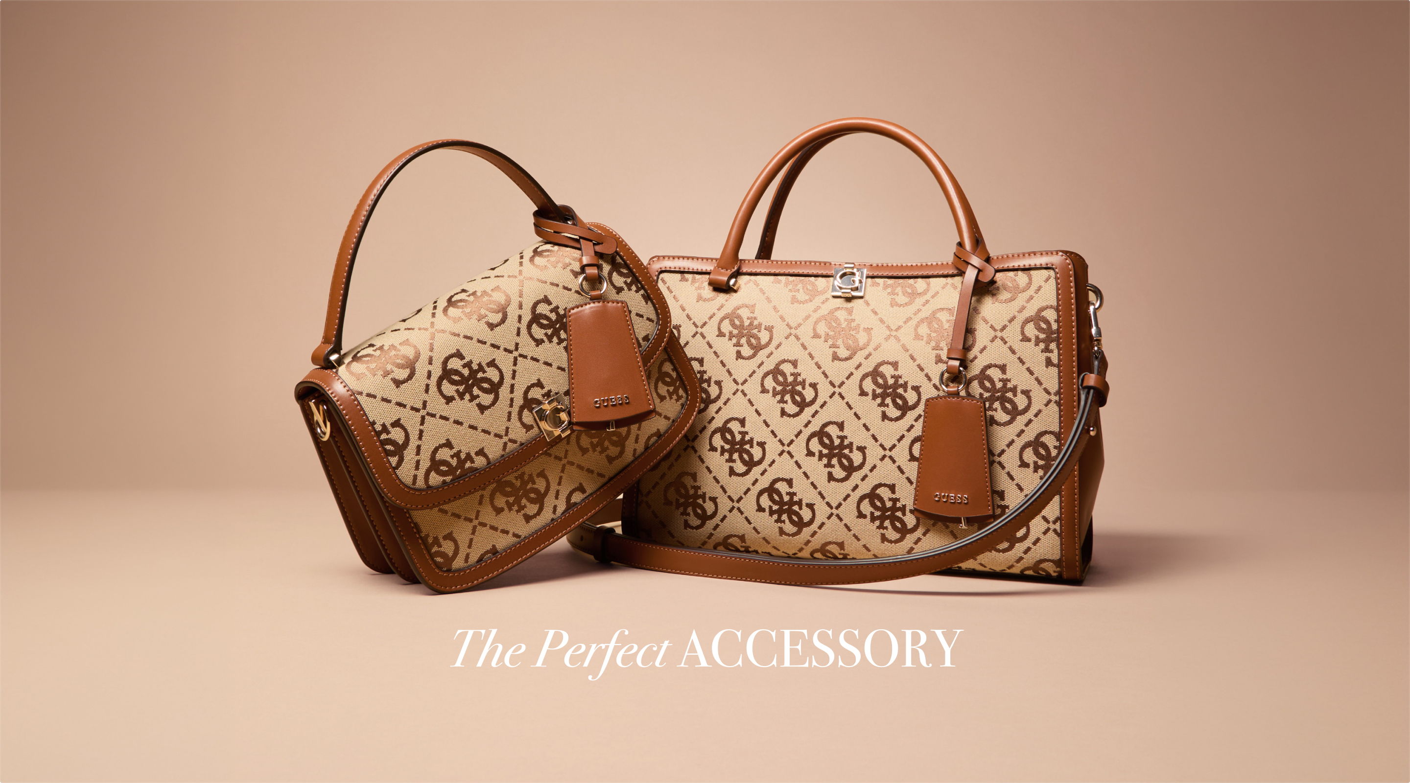 Two stylish GUESS handbags displayed on a neutral background.