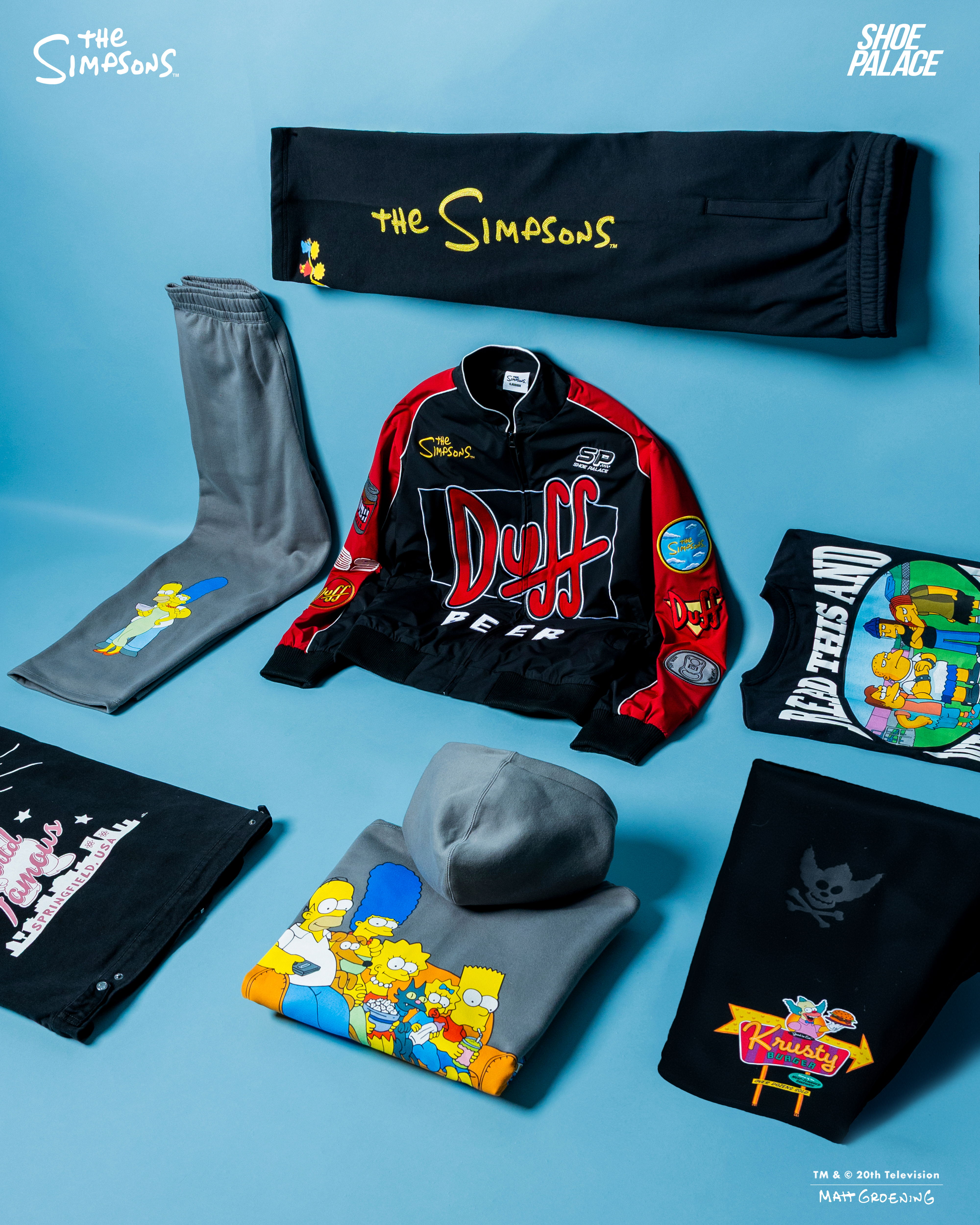 Merchandise featuring characters from The Simpsons on a blue background.