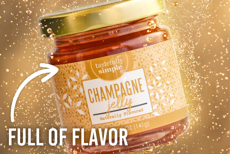 Tastefully Simple Champagne Jelly jar surrounded by sparkling bubbles with the text 