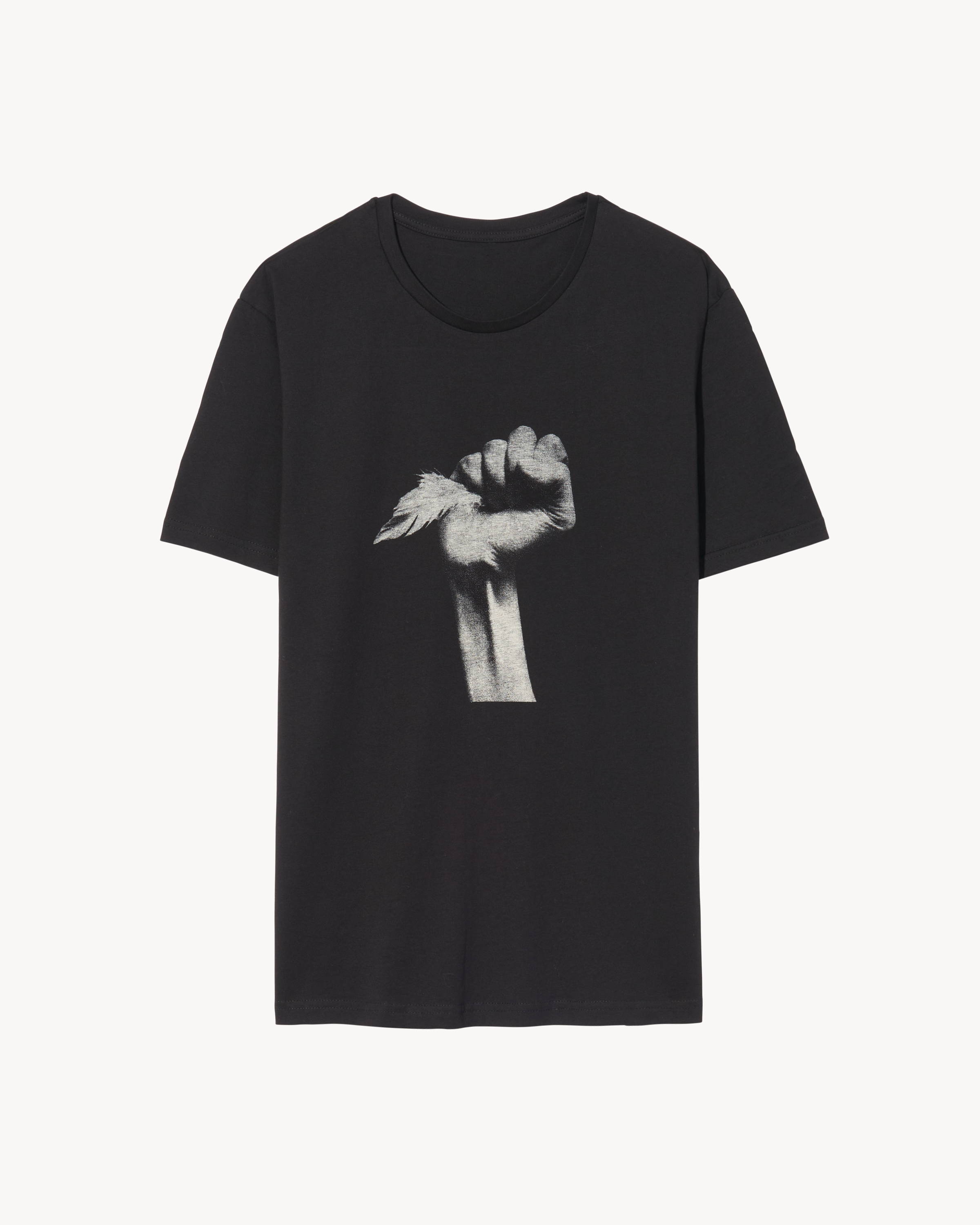 A black tee with a black and white image of a hand holding a feather.