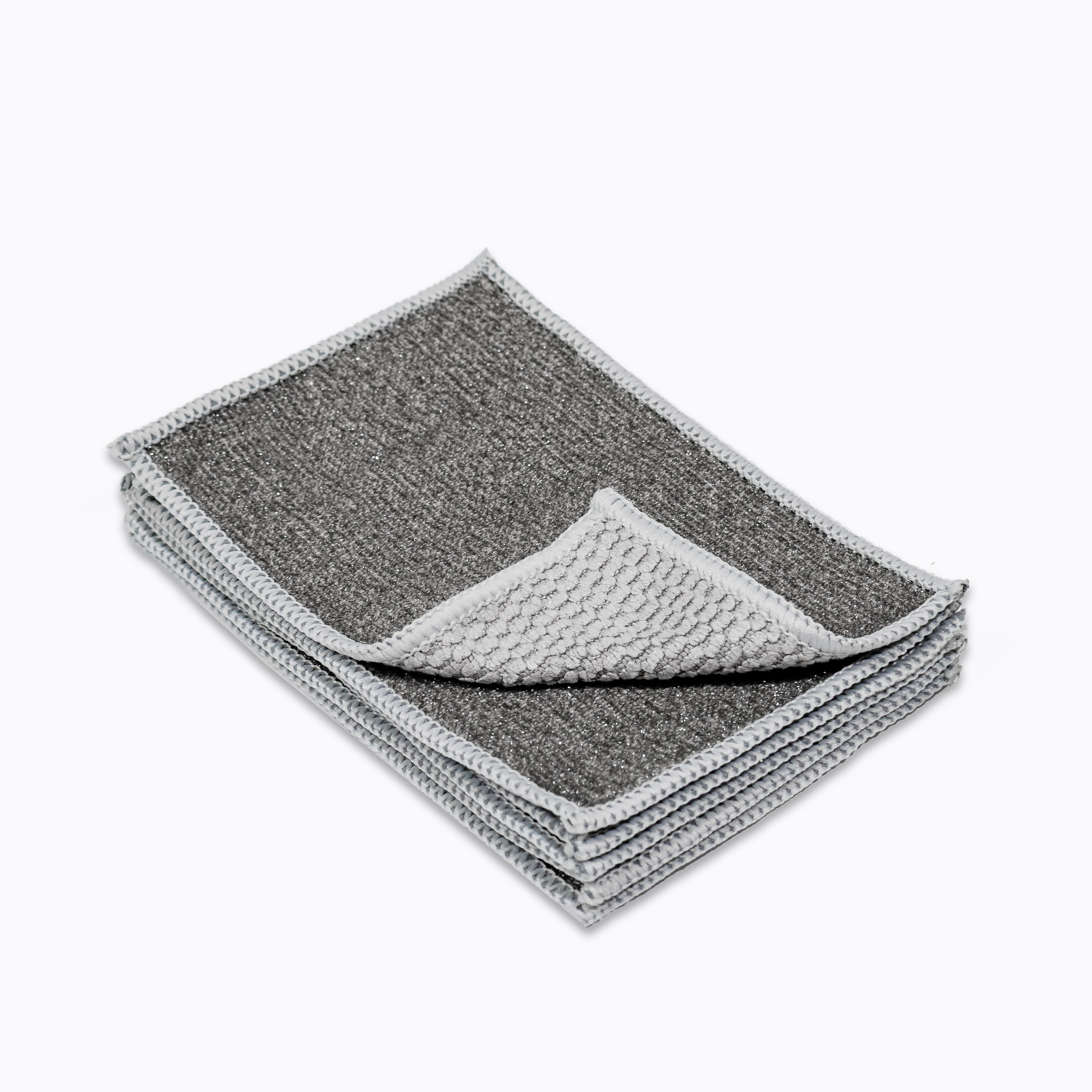 Stack of gray kitchen towels with a textured design.