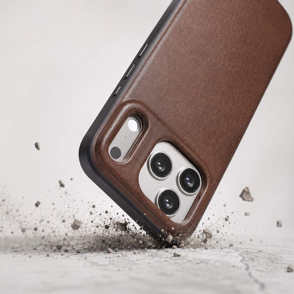 iPhone 17 Pro Hülle aus Leder und TPU Schutzrahmen fällt auf einen harten Untergrund