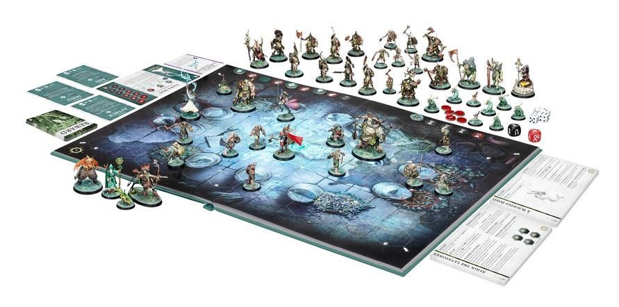 Warhammer quest darkwater Board game setup with miniatures, game board, and various cards displayed.