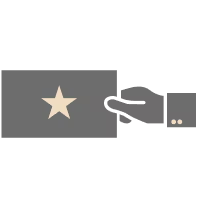 A hand holding a card with a star on it.