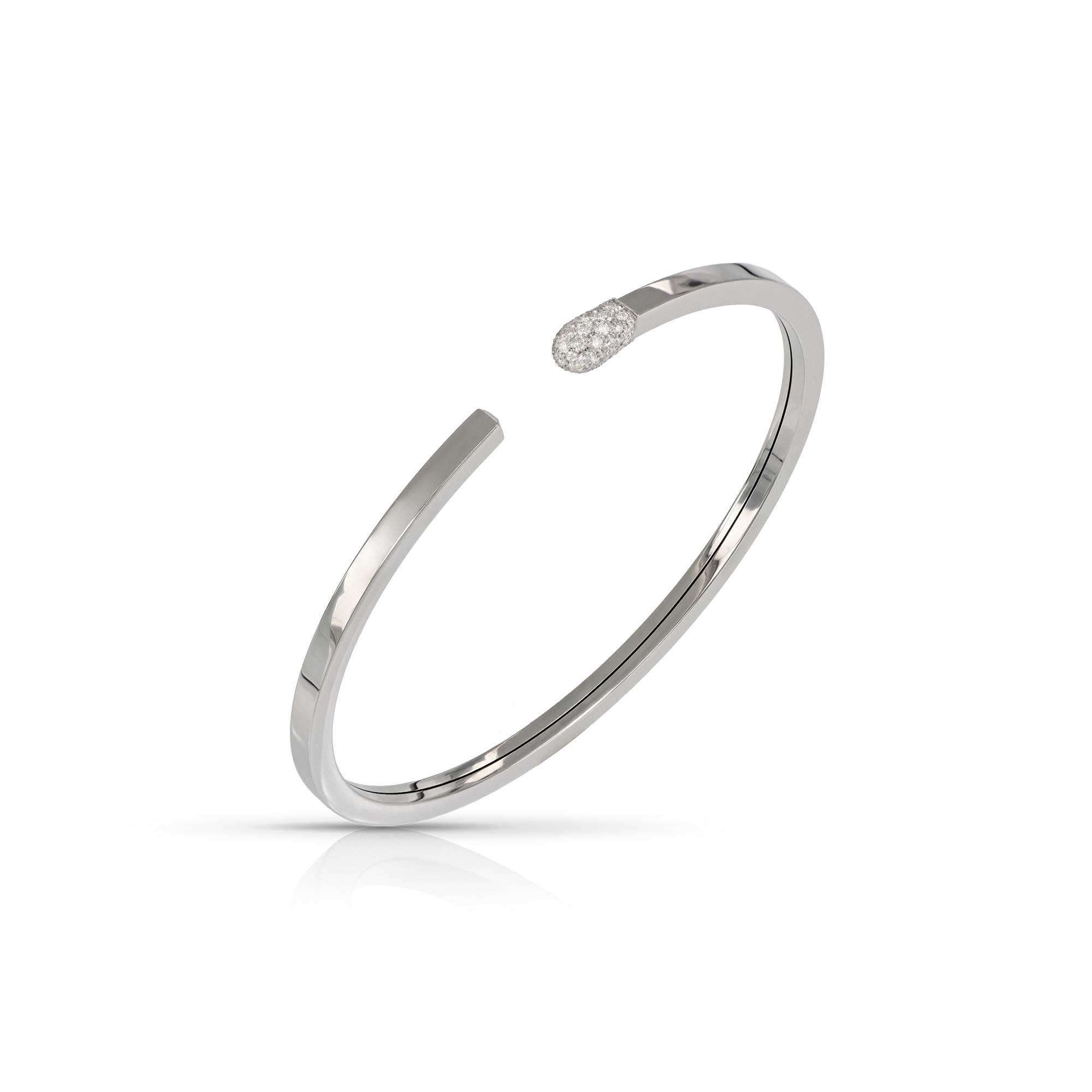 Silver minimalist cuff bracelet on a reflective surface.