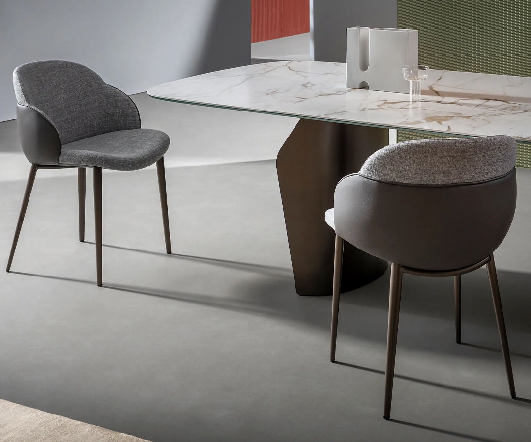 Modern Bonaldo dining table with two stylish My Way dining chairs..