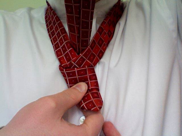 Tie a Four In Hand Knot Step 8
