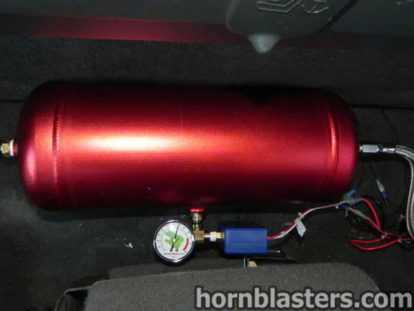 Red air tank and gauge mounted inside the cabin of Thomas's 2005 Chevrolet Silverado 1500, install photo 7