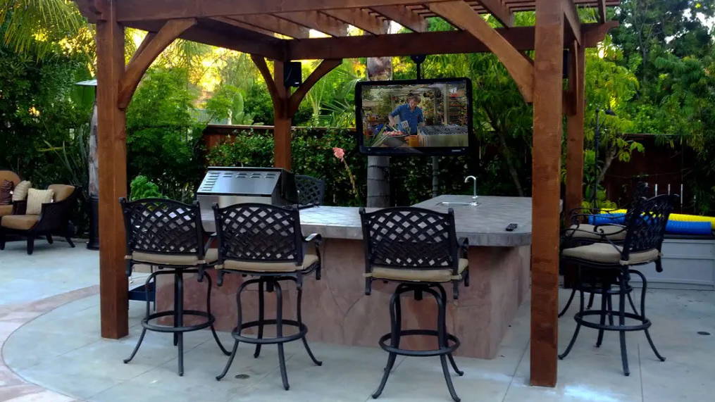 The TV Shield outdoor TV enclosure under cabana is weatherproof